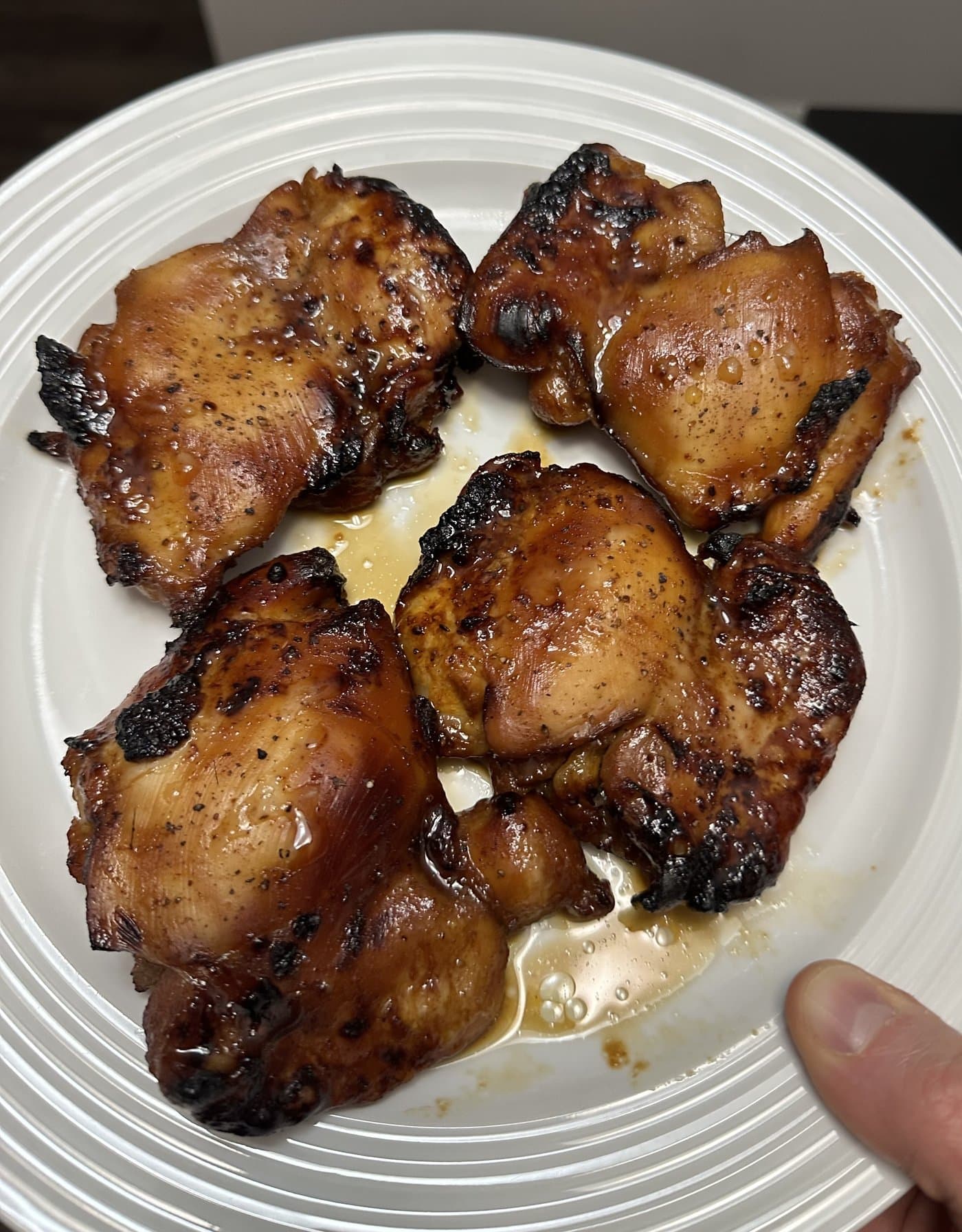 Golden glazed chicken thighs cooked crisp in an air fryer